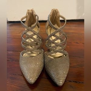 Gold ankle heels with zip closure in the back